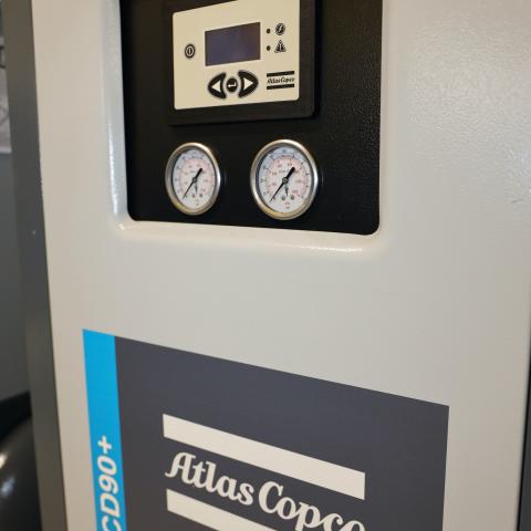 Close-up of an Atlas Copco compressor, available through Dynamic Fluid Power